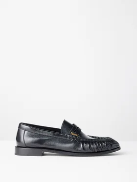 SHOP SAINT LAURENT >
