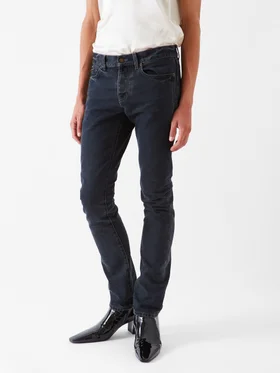 SHOP SAINT LAURENT >