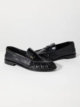 SHOP SAINT LAURENT >
